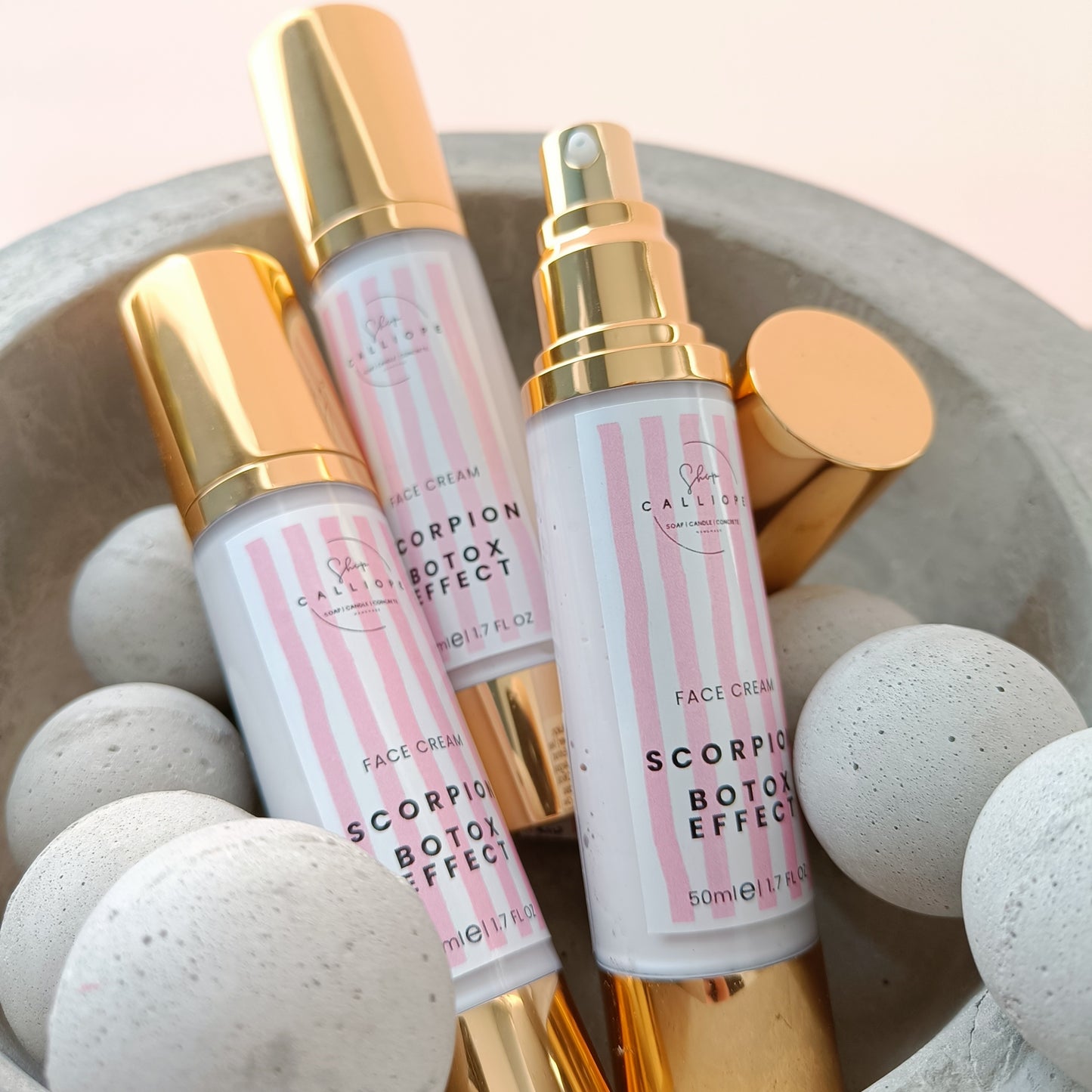 A pump bottle of Scorpion Botox Effect face cream with a gold cap, labeled for anti-wrinkle and moisturizing benefits.