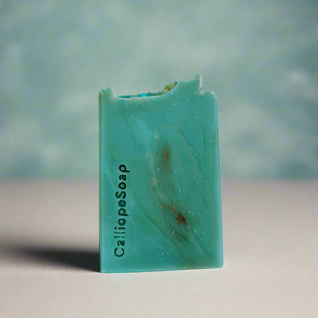 Green soap bar with 'CalliopeSoap' branding on a white background