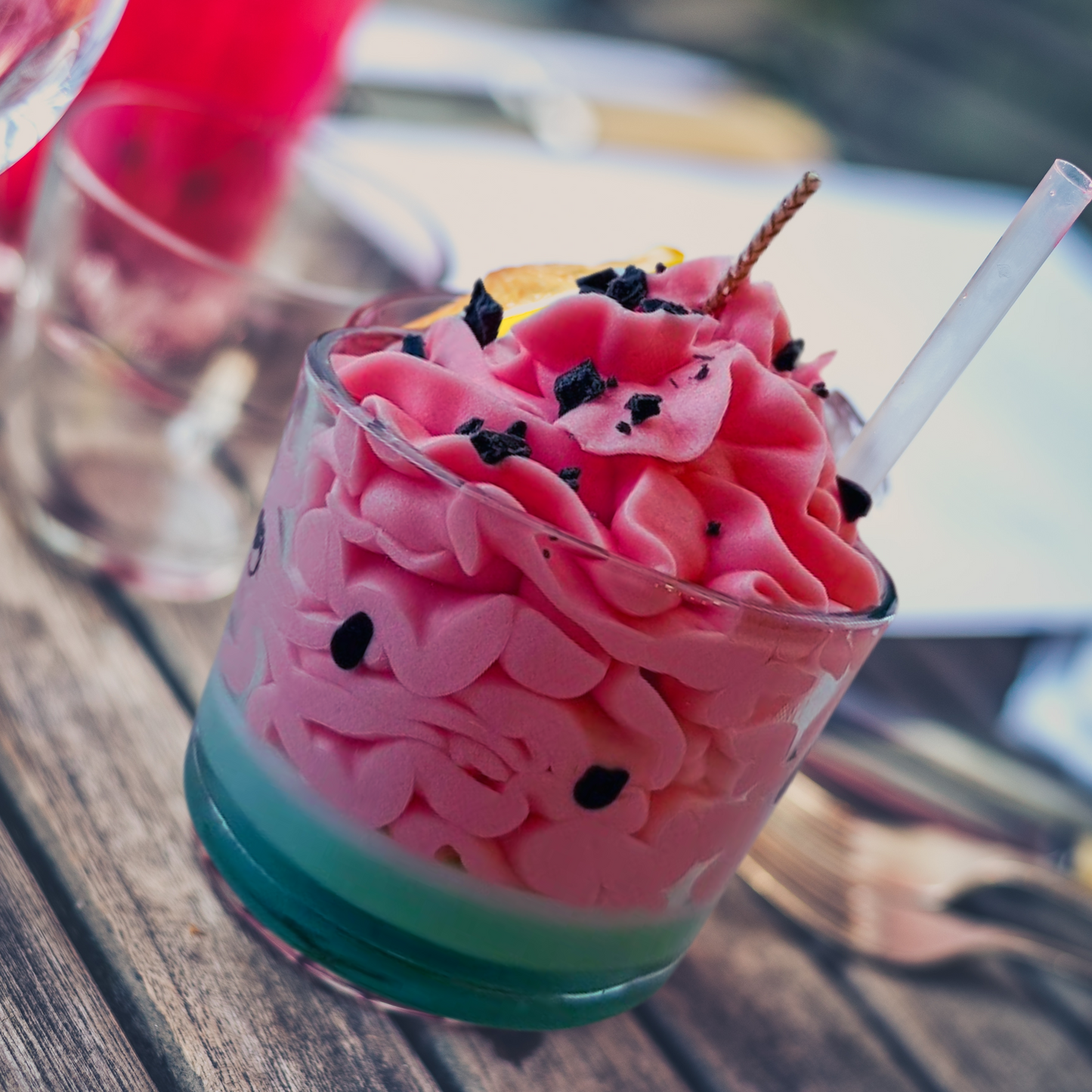 watermelon candle in a glass jar