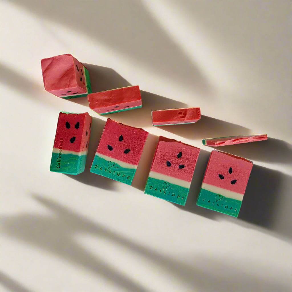 Watermelon-themed building blocks on a white surface