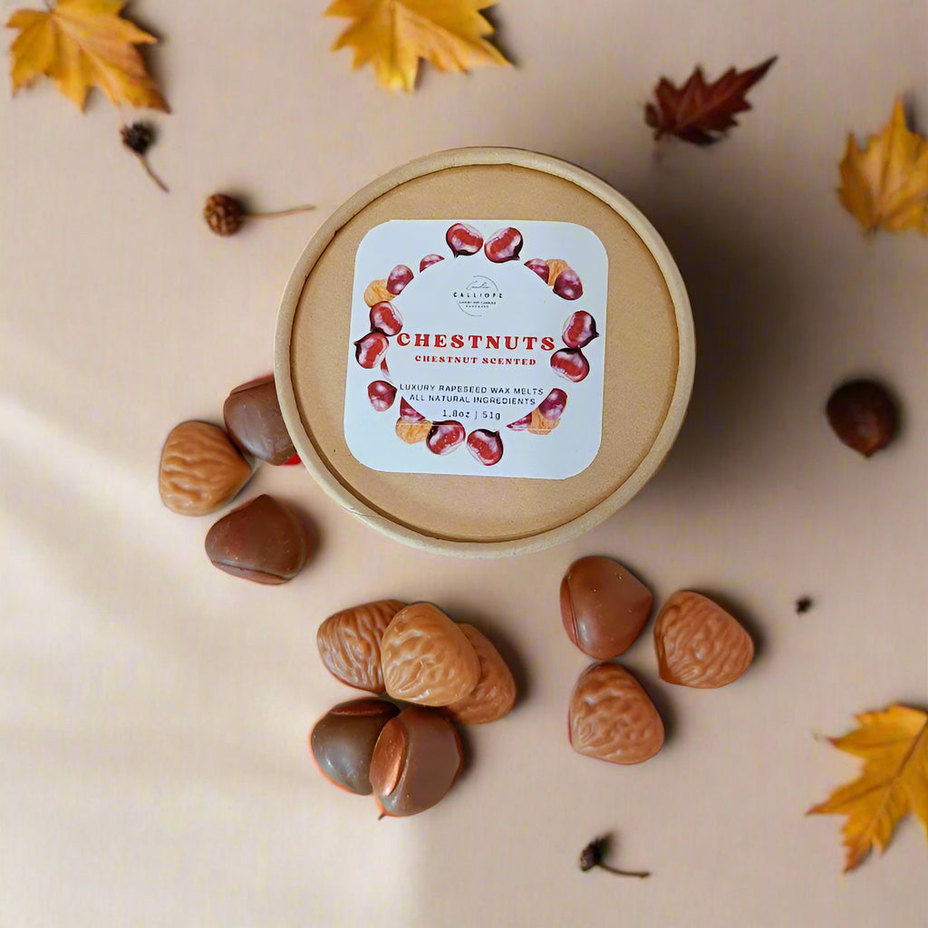 Chestnuts wax melts in a paper craft container with a label on a light background