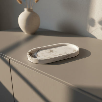 Marble-patterned soap dish on a light gray surface