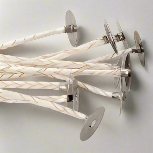 Cotton wicks on a plain background