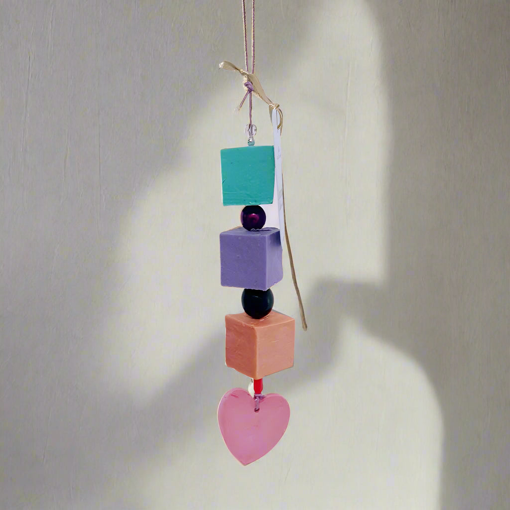 Colorful soap beads hanging ornament on a white background