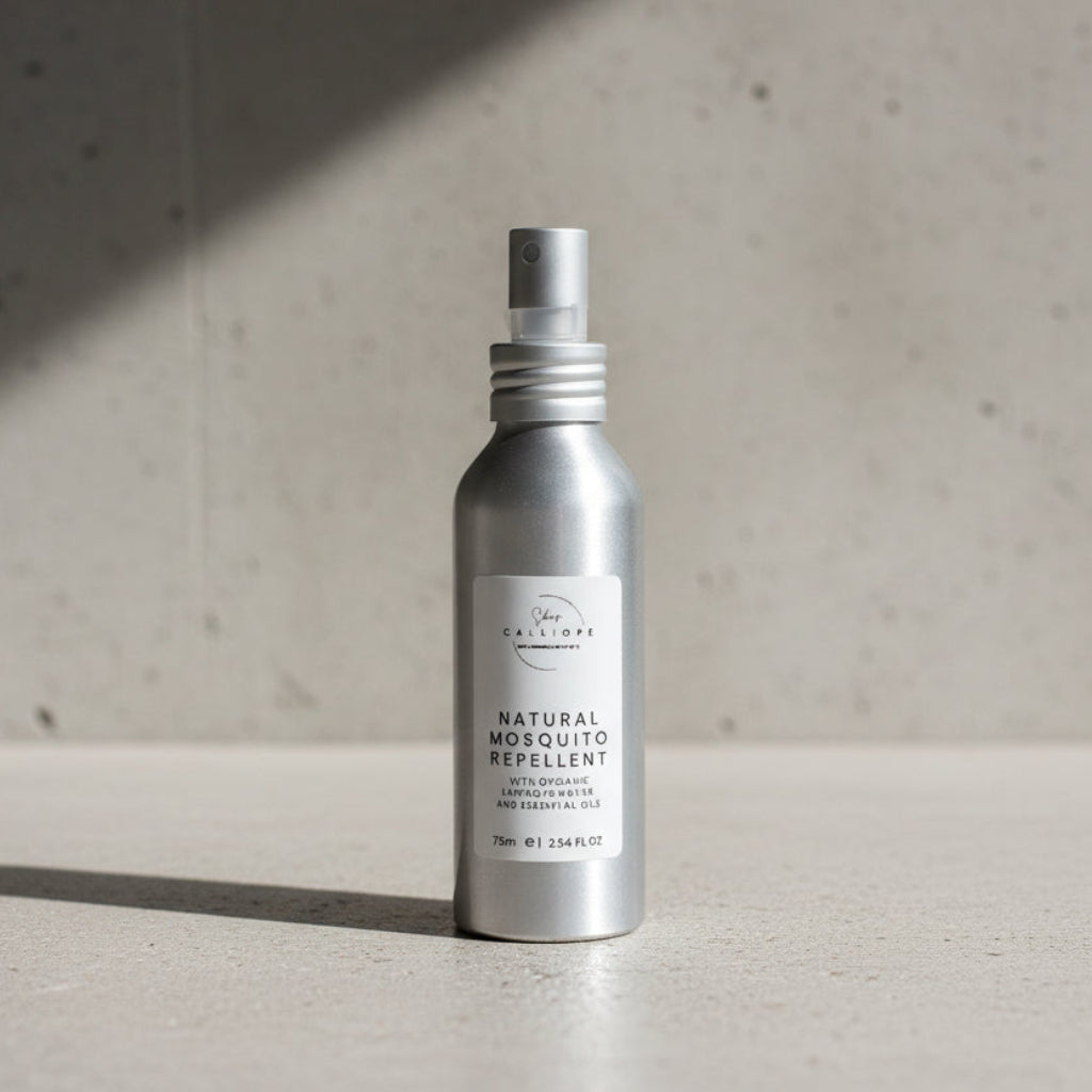 Bottle of natural mosquito repellent on a surface with a gray background
