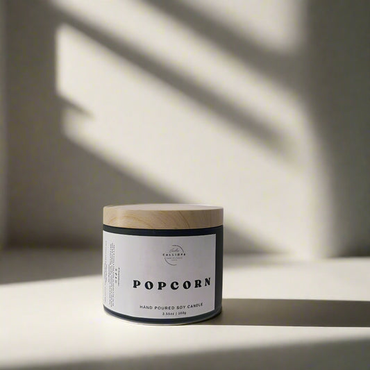 popcorn candle in black tin
