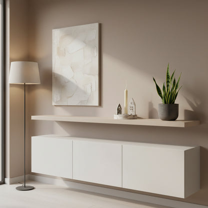 Modern interior design with a white cabinet, shelf, and decorative items.
