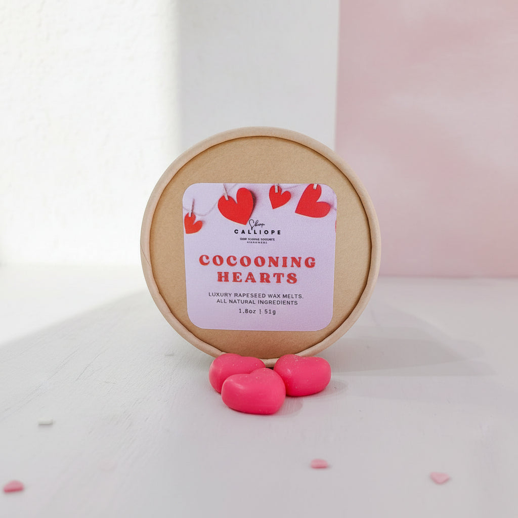 Cocooning Hearts wax melts with a round container on a white background