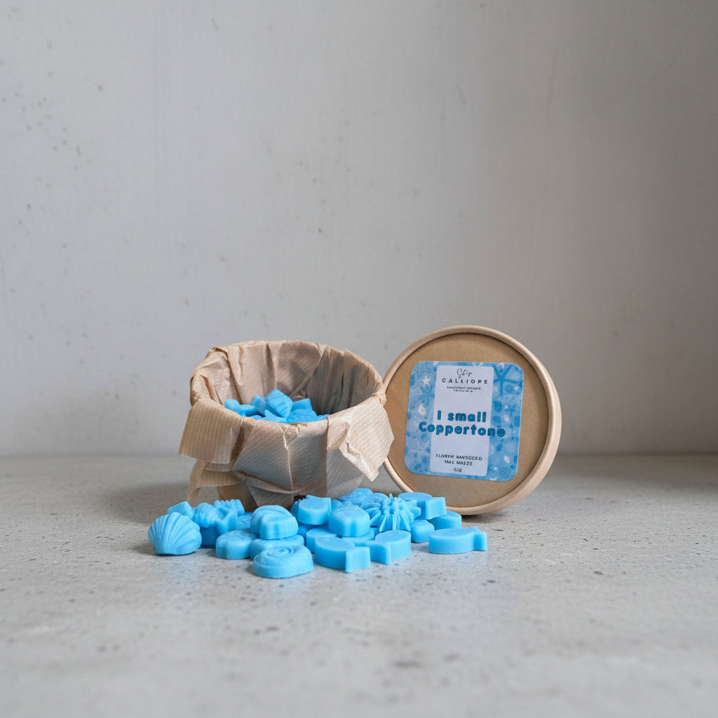 wax melts σε μπλε χρώμα με σχήμα ψαράκια και κοχύλια με άρωμα κοπερτον 