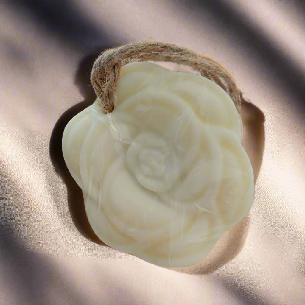 wax tart flower shaped on light gray background